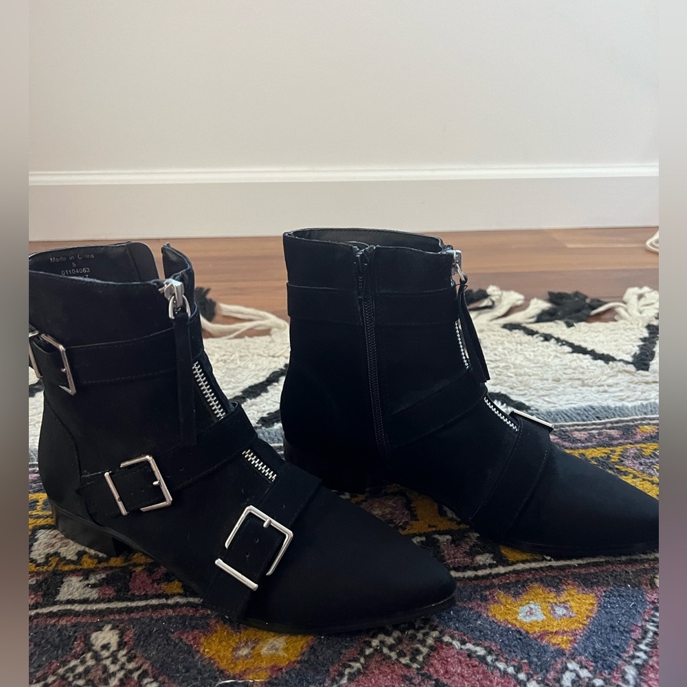 Black ankle booties with silver zipper and buckles size 7